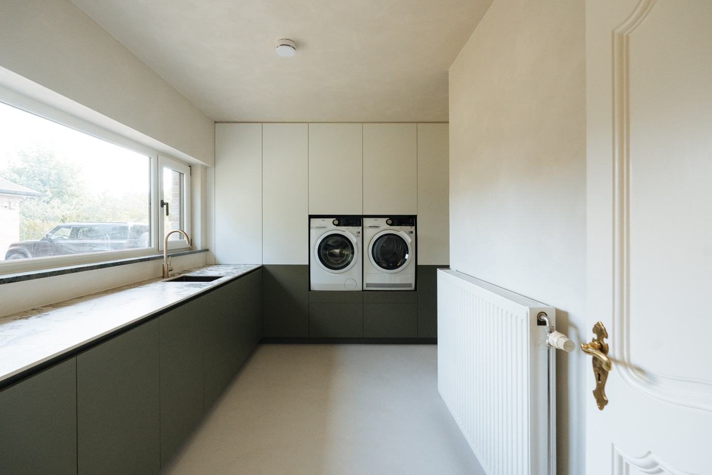 Wasruimte met vloer in Micro-Quartz